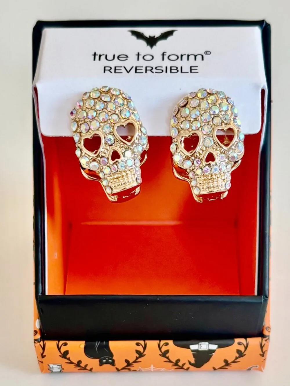 True to Form Reversible Skull Hinged Huggie Earrings Gold Tone Pave Rhinestones